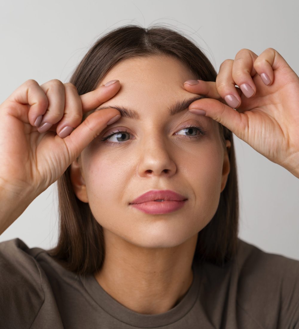 portrait-woman-trying-facial-yoga-massage-stay-young